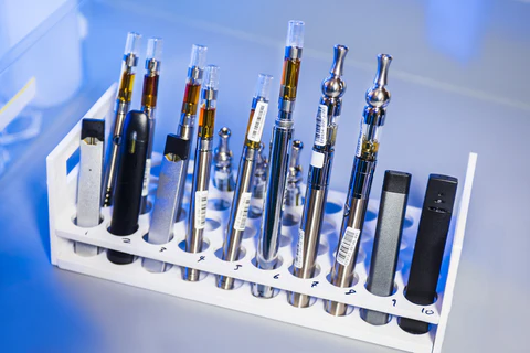 Cannabis vape pens sitting in a holder